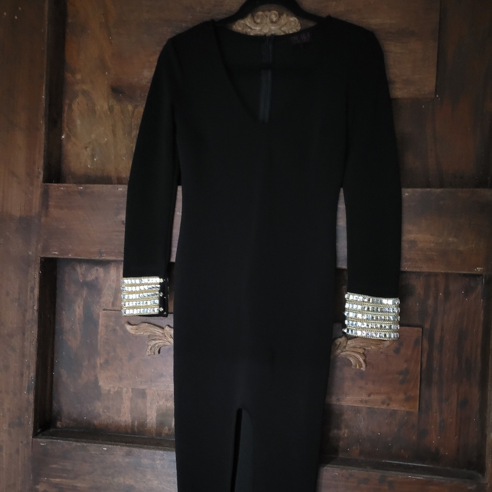 Black dress with rhinestone cuff sleeves.